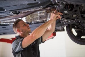 Car mechanic Identifying Car Leaks